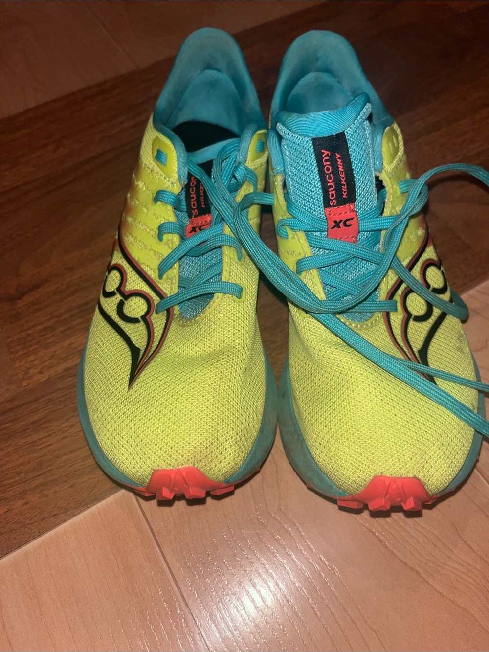 Saucony Neon Yellow and Teal cross country spikes
